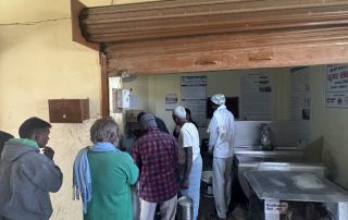 People lined up to sell their milk