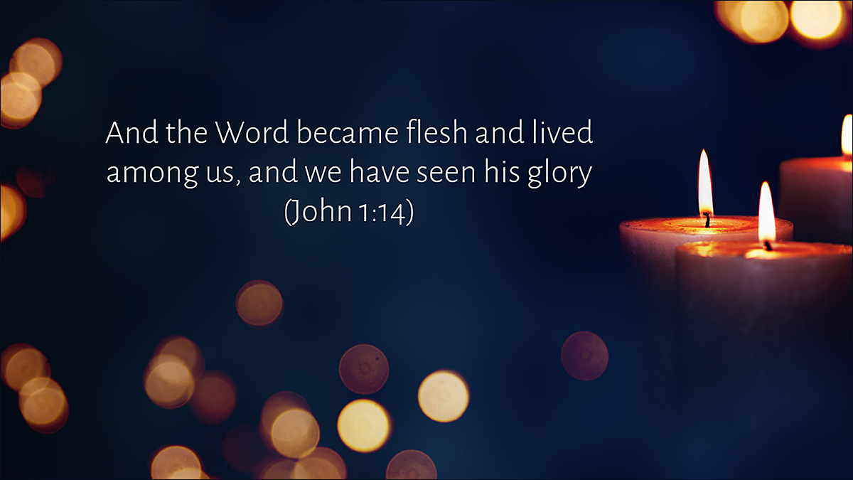 Advent/Christmas worship slide with a Bible verse from John 1:14.