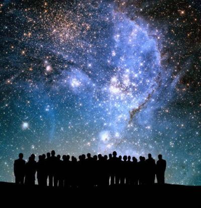 Crowd of people observing night firmament