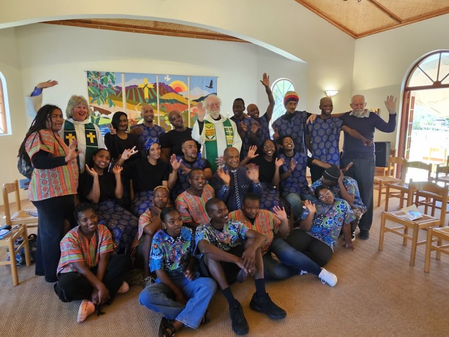 Group of people posing in common room_SA Group of people posing in common room, South Africa